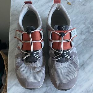 On shoes. Size 7.5 grey with rust detail